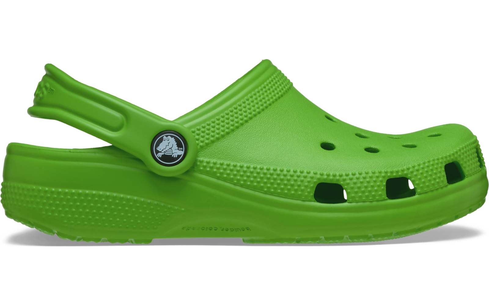 Sabot vert en plastique de profil avec lanière au talon, trous d'aération et semelle texturée