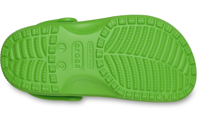 Semelle inférieure verte d'un sabot avec relief et logo Crocs