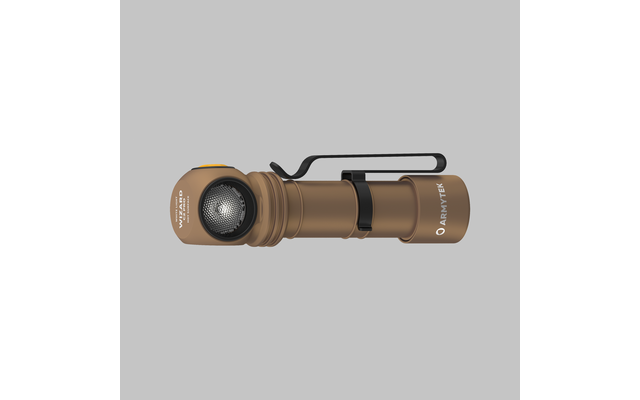 Braune Taschenlampe mit Handschlaufe auf grauem Hintergrund