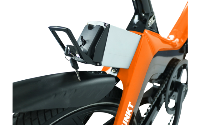 Close-up of an orange bicycle with a battery compartment and a rear mudguard