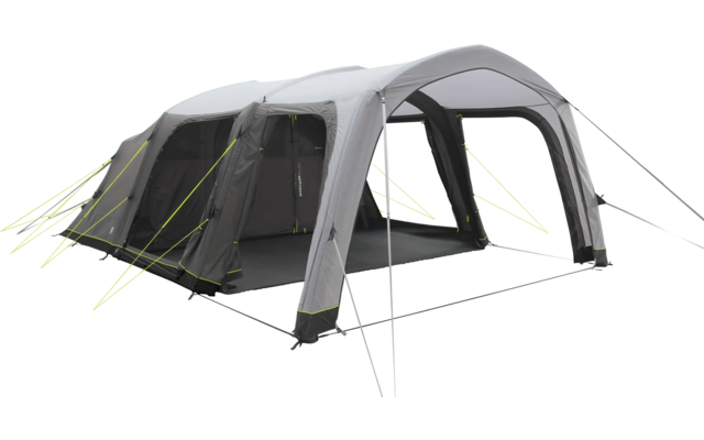 Großes graues und weißes Zelt mit mehreren Fenstern auf grünem Gras