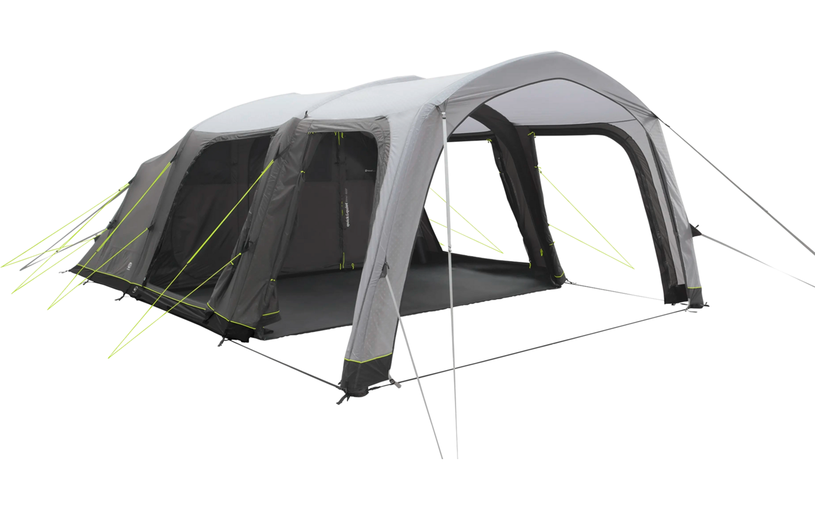 Großes graues und weißes Zelt mit mehreren Fenstern auf grünem Gras