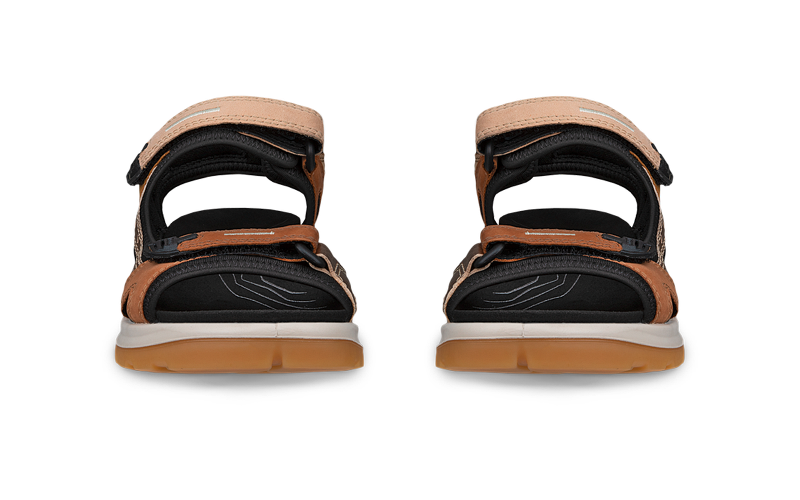 Vue de face d'une paire de sandales brunes avec semelles intérieures noires, semelles intermédiaires blanches et semelles extérieures beige