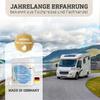 Weißes Wohnmobil auf einer Straße am See vor Bergen und wolkigem Himmel; links ein Produktbehälter mit goldener Plakette "awiwa Versprechen", Text "JAHRELANGE ERFAHRUNG bekannt aus Fachpresse und Fachhandel" oben und "MADE IN GERMANY" mit deutscher F