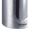 Gros plan d'un objet cylindrique en acier inoxydable avec une fenêtre ovale et l'inscription de la marque WESTMARK QUALITY
