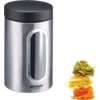 Boîte de rangement en acier inoxydable avec couvercle noir et fenêtre ovale, à côté trois nids de pâtes colorés (vert, jaune, orange)