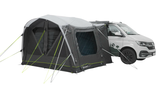 White car with gray tent attached to the side of the car