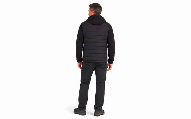 Person seen from behind wearing a black quilted hooded jacket, black pants and black shoes on a white background