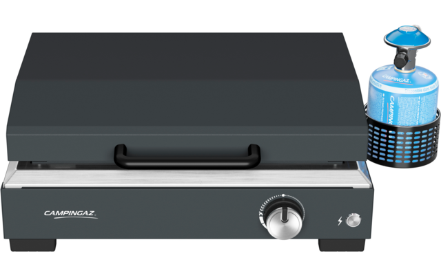 Graues rechteckiges Gerät mit flachem Deckel, schwarzem Vordergriff und Drehregler; rechts kleine blaue Gasflasche in schwarzem Halter