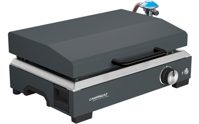 Gray rectangular grill appliance with closed lid, black front handle, control knob on the right, "CAMPINGAZ" logo on the front and blue gas connector at the rear right