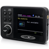 Zwart draagbaar DAB-radioapparaat met scherm, linker draaiknop en knoppen; scherm toont 'DAB', 'No stations' en 'Not available'; logo 'REFLEXION' onderaan