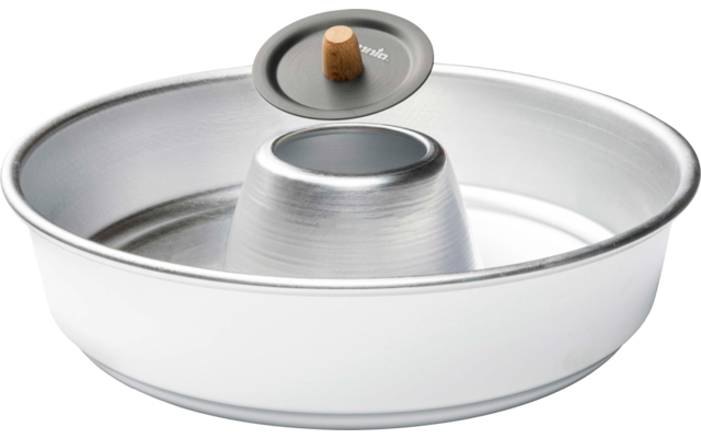 Moule rond en métal blanc avec un tube central et un couvercle rond en verre avec poignée en bois