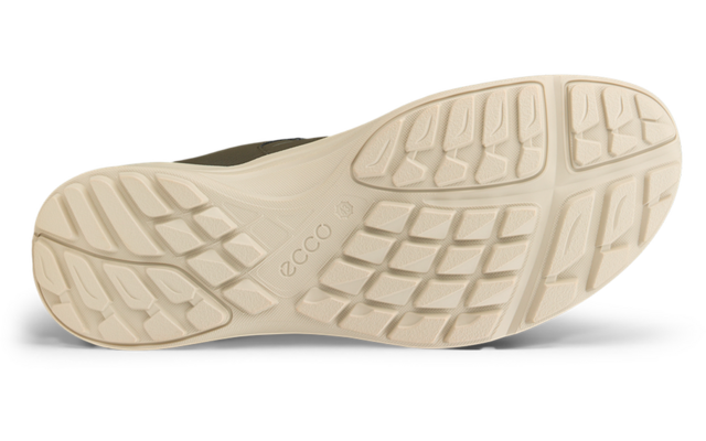 Suela de zapato beige con dibujo de la suela y texto en relieve 'ecco'