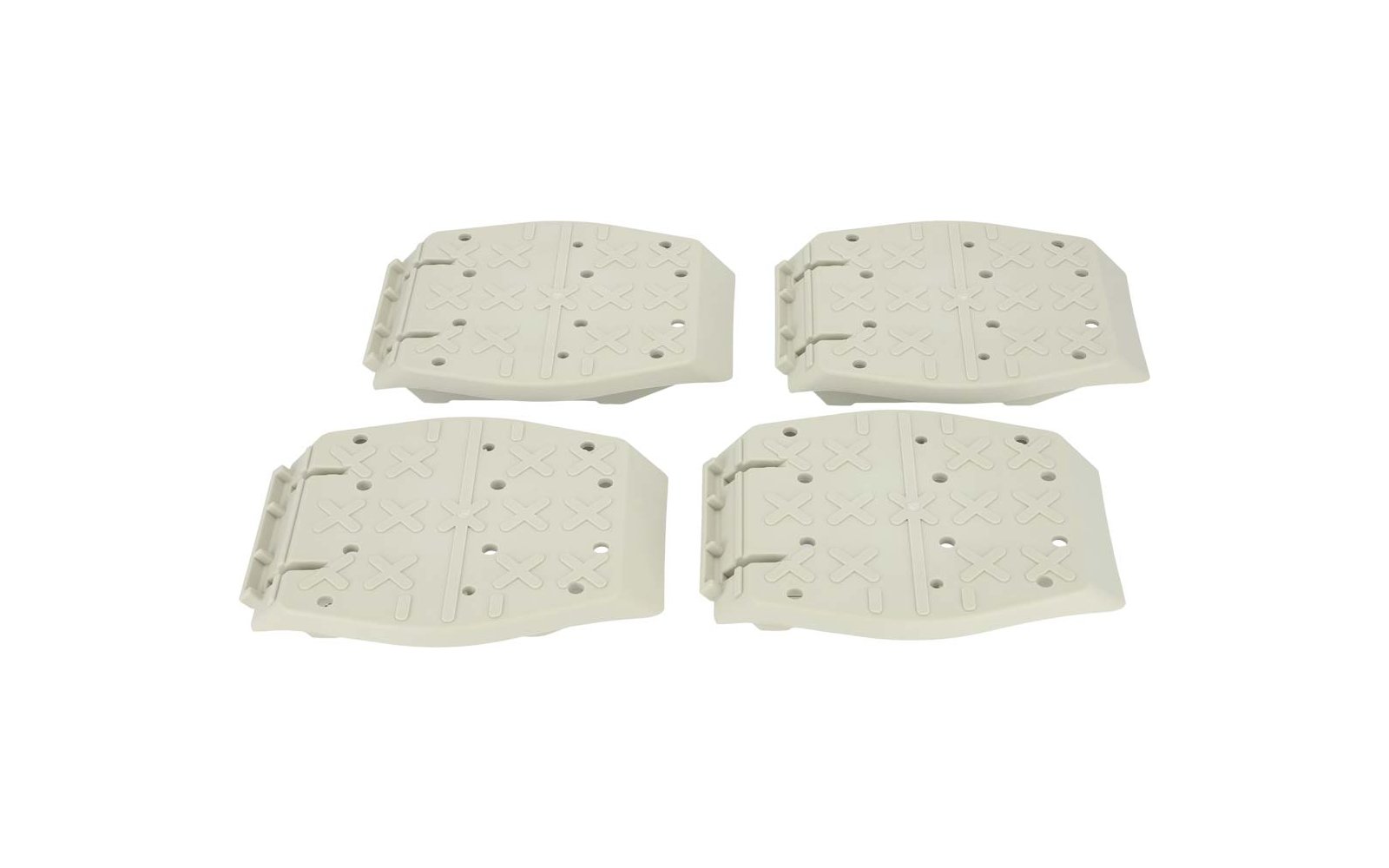 Vier rechthoekige witte kunststof platen met gaten en patronen