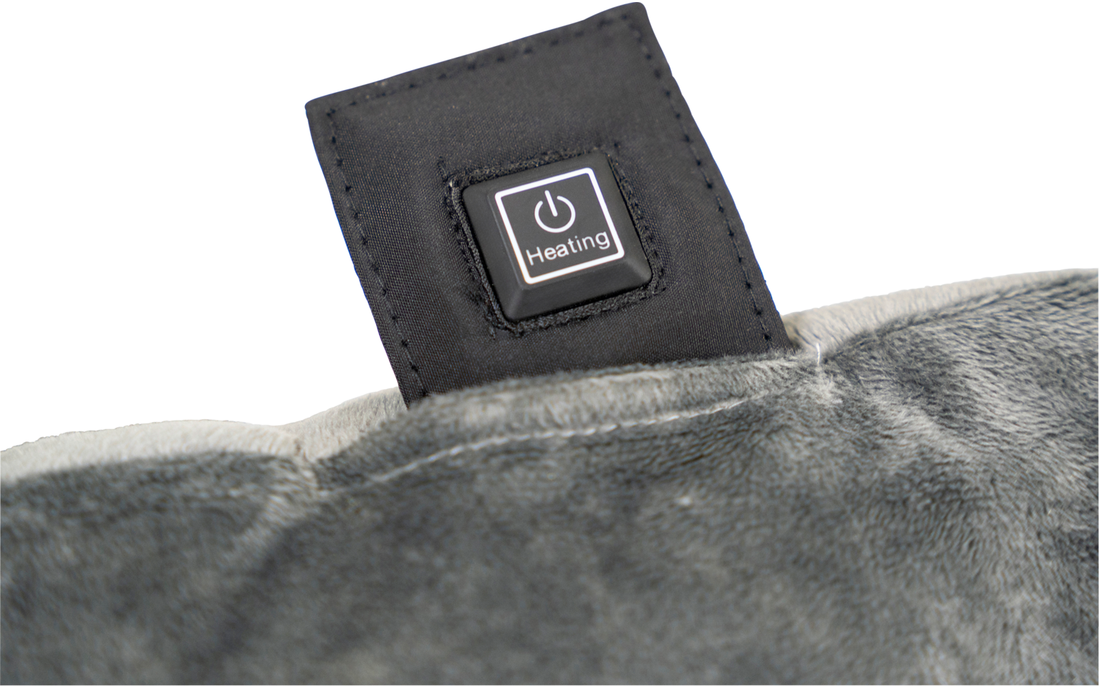 Grauer Plüschstoff mit schwarzem rechteckigem Element, darauf ein Power-Symbol und der Schriftzug "Heating"