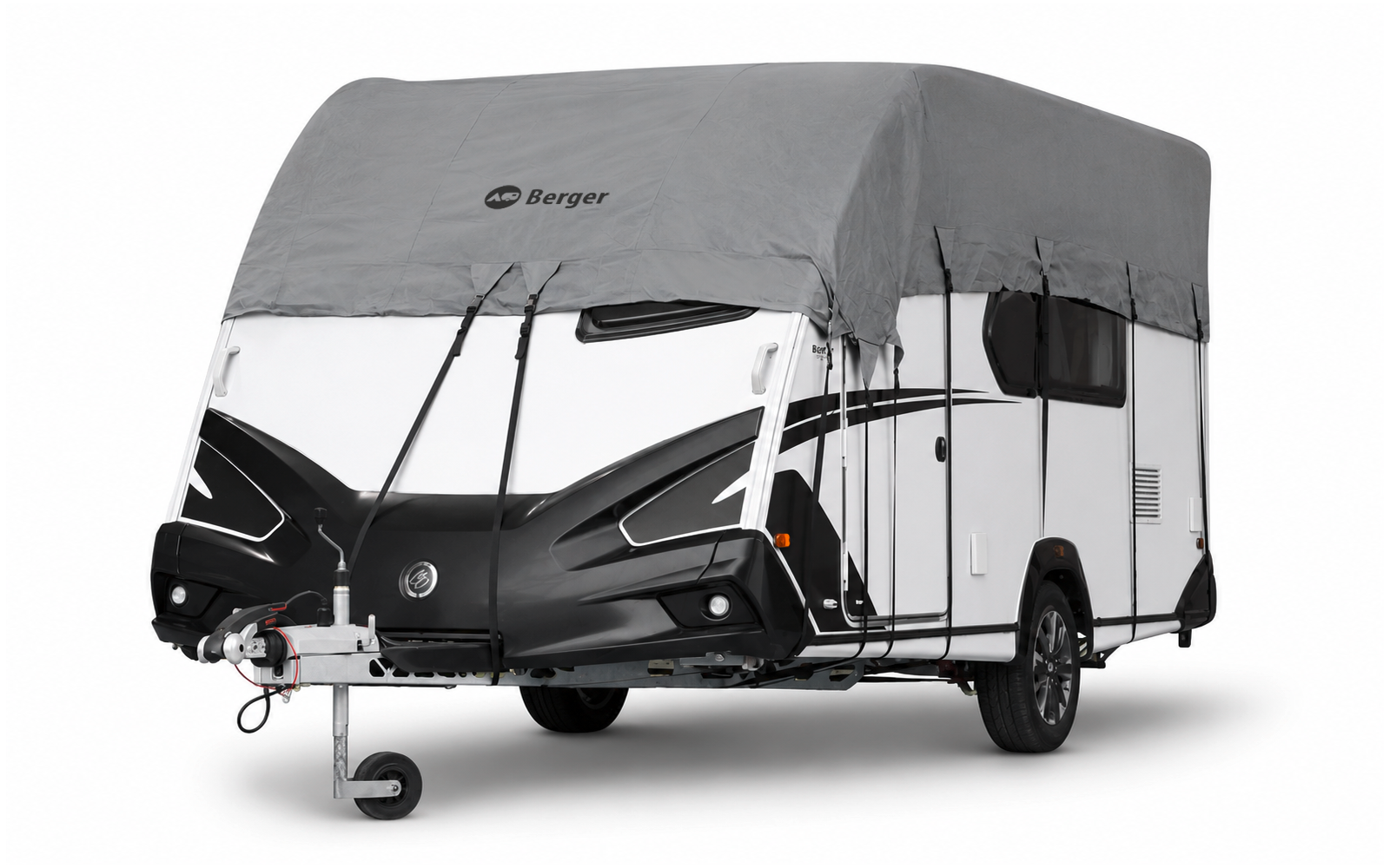 Caravane blanche à face avant noire et housse de protection grise, flèche d'attelage avec roulette de jockey visible