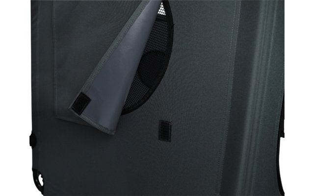 Gray fabric with a round mesh opening, lifted flap with Velcro and two rectangular Velcro patches
