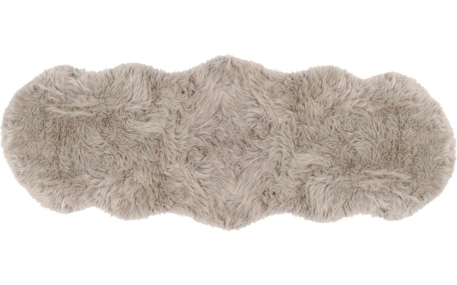 Hellbeiger, flauschiger Teppich mit unregelmäßiger, gewellter Form