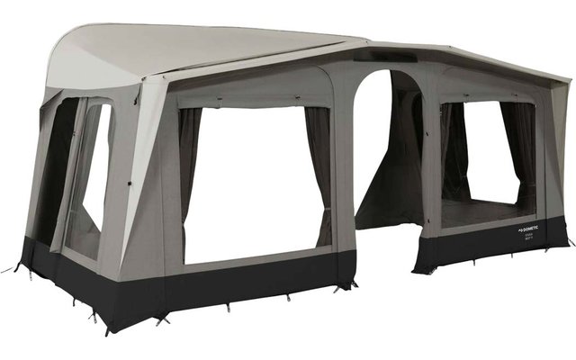 Large beige-grey fabric tent with several large windows, dark curtains, an open central passage, a black base, and visible ground straps and pegs