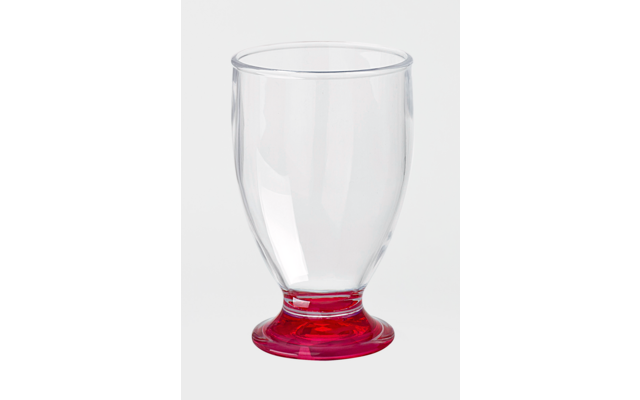Transparent glass with short red base, empty, on white background