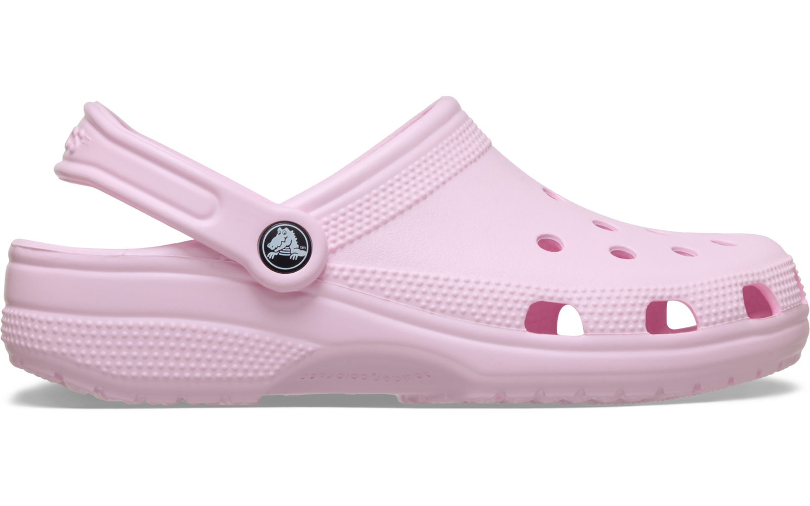 Rosa Clog mit Fersenriemen und Lüftungsöffnungen, Seitenansicht