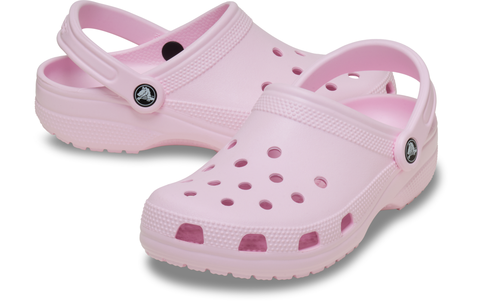 Pinkfarbene Kunststoff-Clogs mit Lüftungsöffnungen, verstellbarem Fersenriemen und rundem Logo-Knopf an der Seite