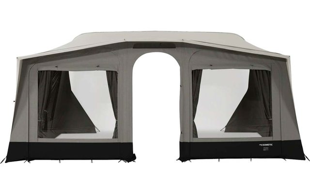 Large light-beige and gray tent with two rectangular windows with open curtains and a central arched doorway