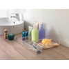 Étagère de salle de bain avec distributeurs de savon, brosses à dents et savon