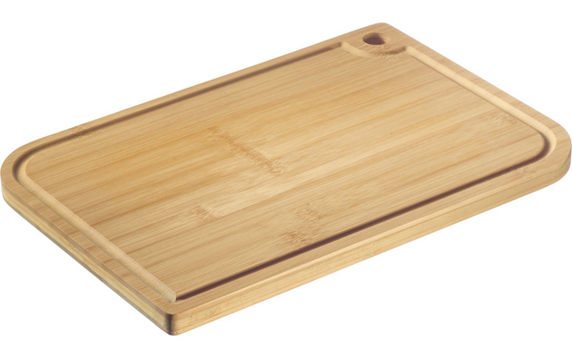 Rectangular bamboo cutting board with a surrounding juice groove and a round hole in one corner