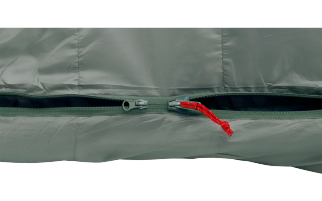 Nahaufnahme eines dunklen Reißverschlusses auf grauem Stoff