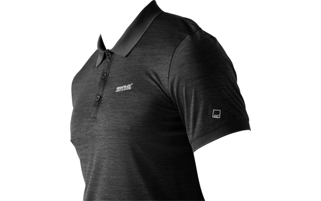 Man, torso up, in three-quarter profile facing left, wearing a dark gray polo with small logos on chest and sleeve, light solid background