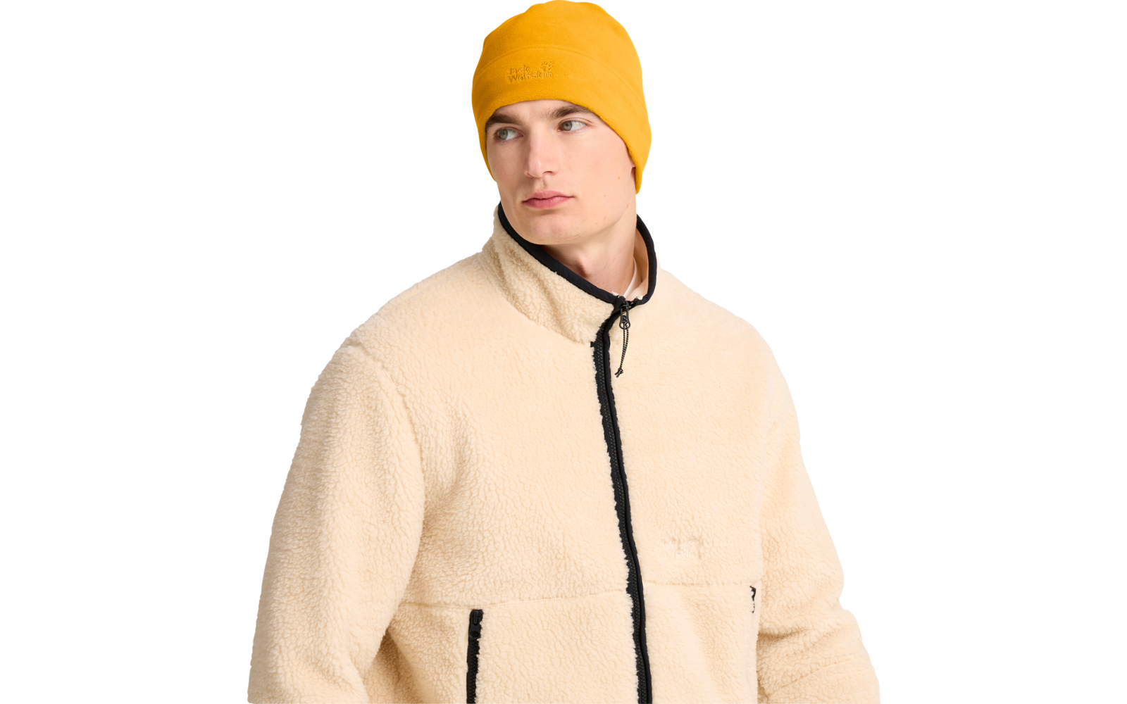 Mann mit gelber Mütze und beiger Fleecejacke, Blick nach rechts