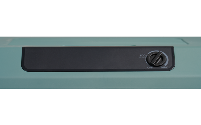 Türkisfarbene Oberfläche mit schwarzem rechteckigem Panel und rundem Drehregler rechts, Beschriftung 'OFF' und 'MAX'