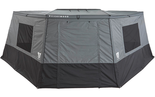 Grau-schwarzes sechseckiges Zelt mit geschlossener mittiger Vorderklappe, mehreren rechteckigen Fenstern und sichtbarem Schriftzug "VICKYWOOD" oben