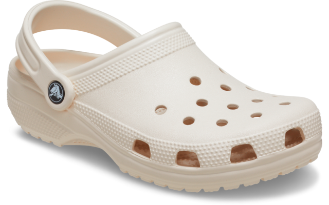 Beiger Kunststoffclog mit Fersenriemen und runden Belüftungsöffnungen oben