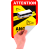 Hand die de hoek van een rode sticker losmaakt; sticker toont een witte bus op geel-zwarte diagonale strepen, meerdere gele driehoeken met uitroeptekens en witte tekst "ATTENTION" bovenaan