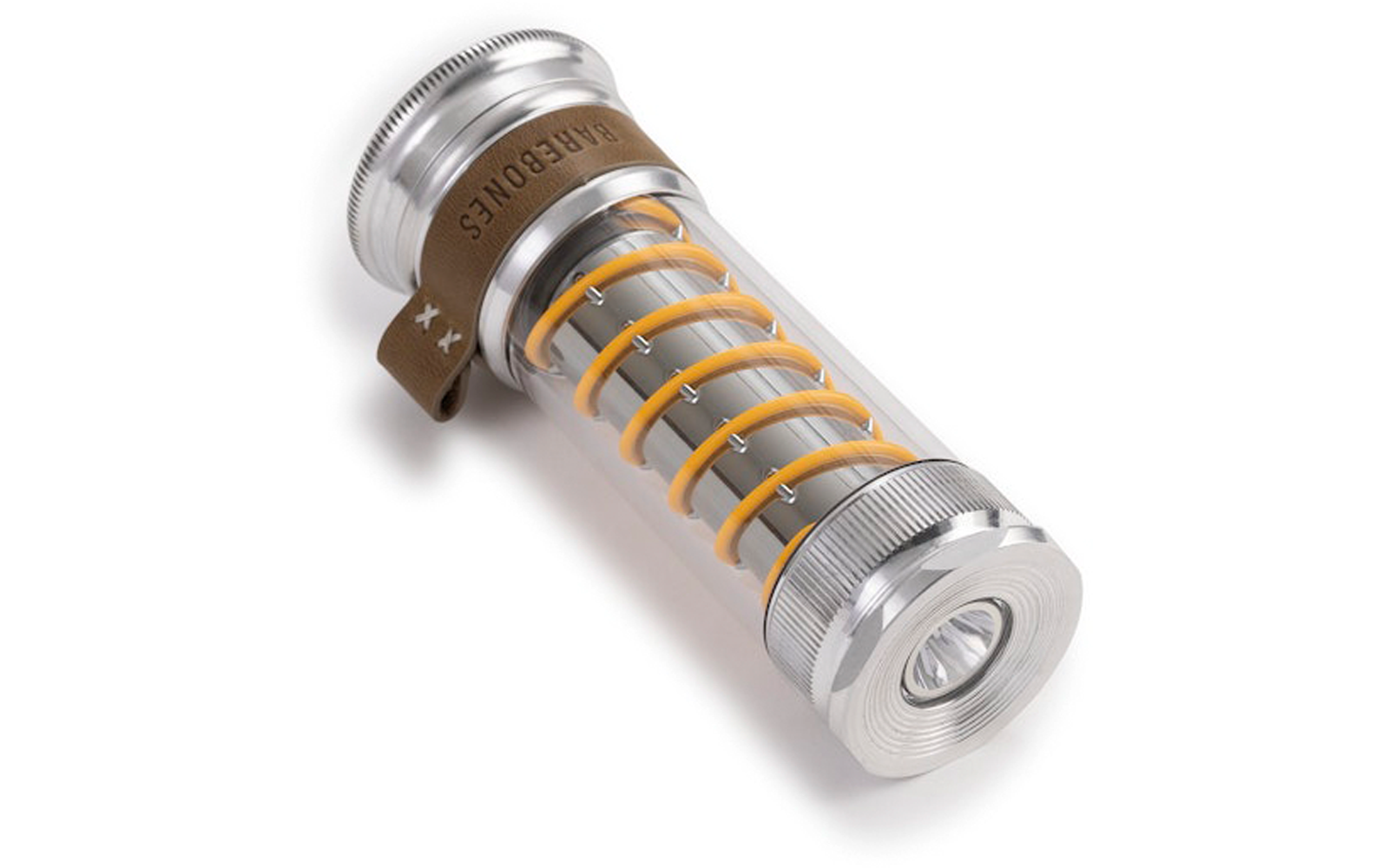 Cilindrisch metalen omhulsel met een doorzichtige buis waarin een gele spiraal zichtbaar is, metalen doppen aan beide uiteinden, klein leren lipje aan één zijde