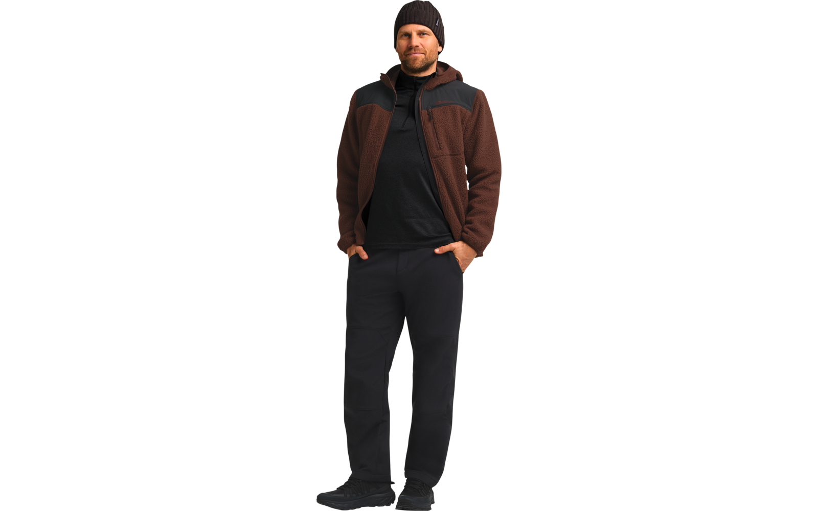 Man met winterkleding, jas, broek en muts