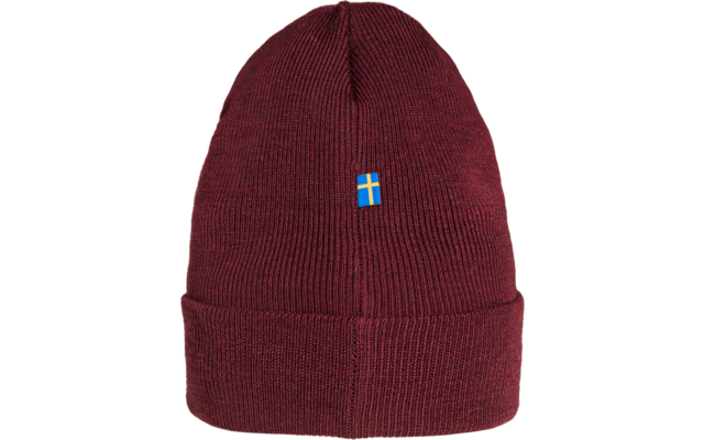 Bordeauxrote Strickmütze mit Umschlag und kleinem blauen Logo vorne