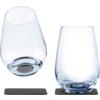 Deux verres transparents sur des dessous de verre noirs, l'un debout et l'autre couché sur le côté