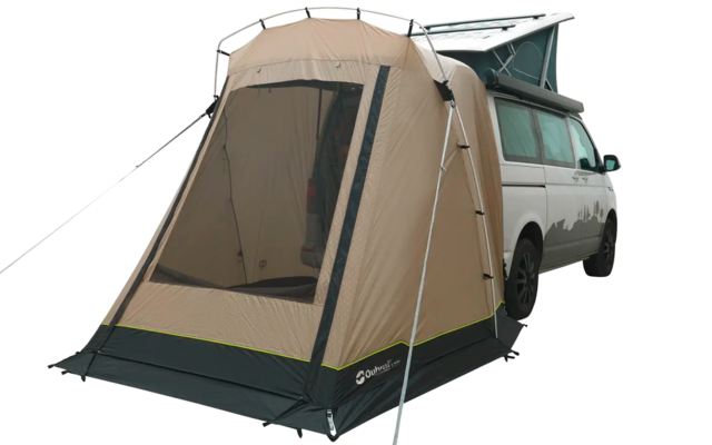 Car with attached brown camping tent