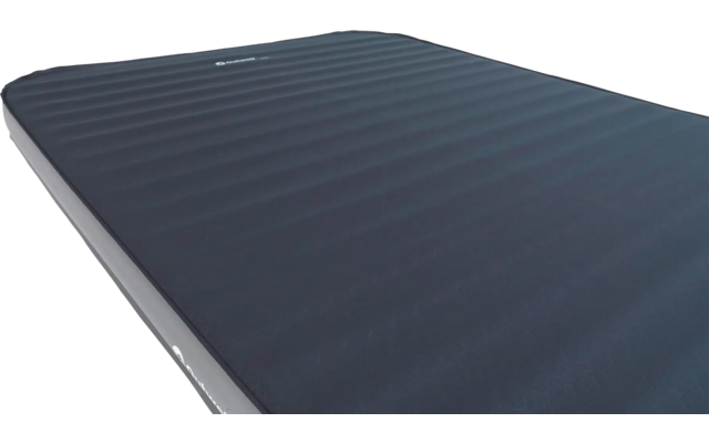 Close-up van een donkerblauw luchtbed met textuur