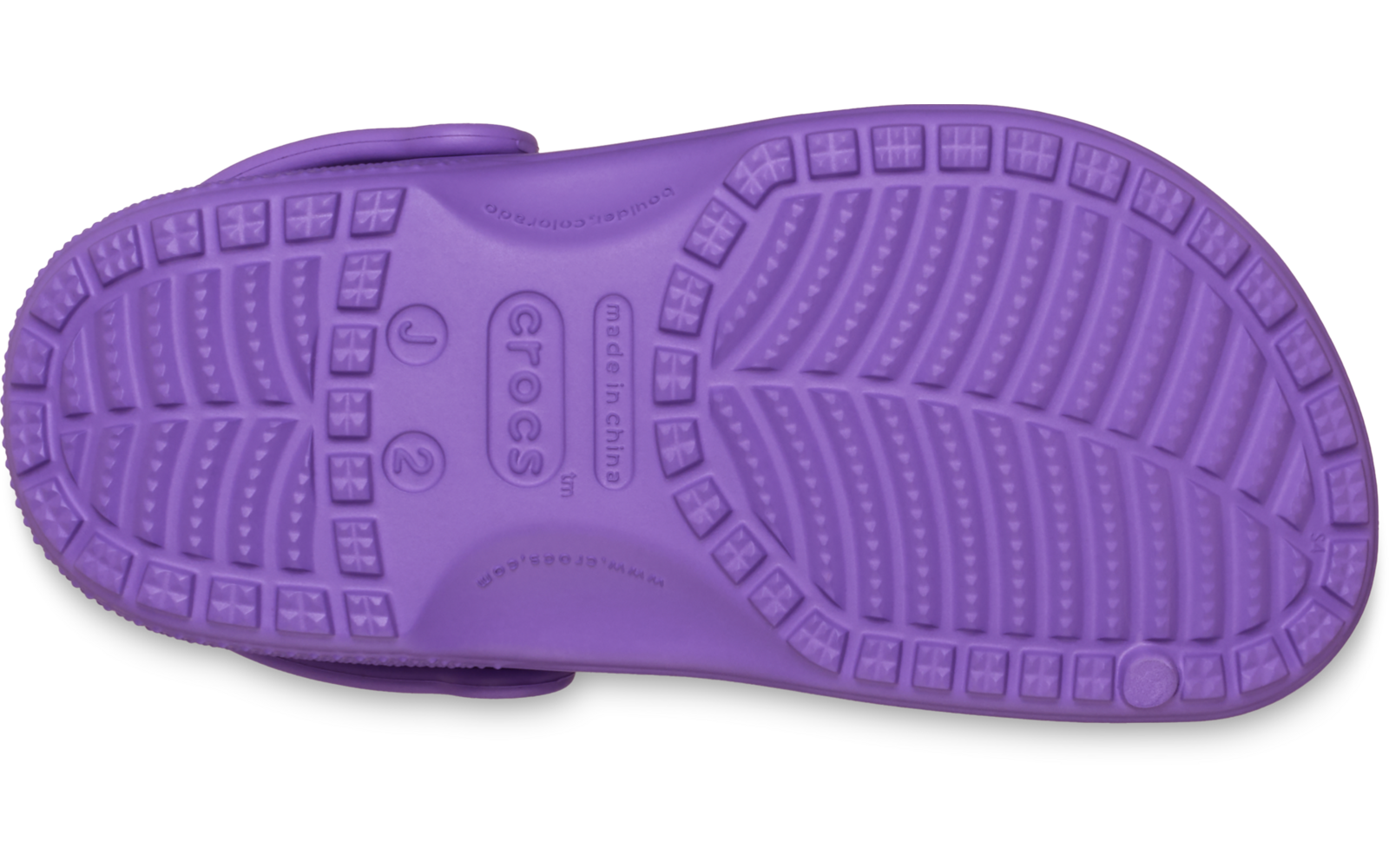 Semelle violette d’un sabot avec profil et logo CROCS en relief