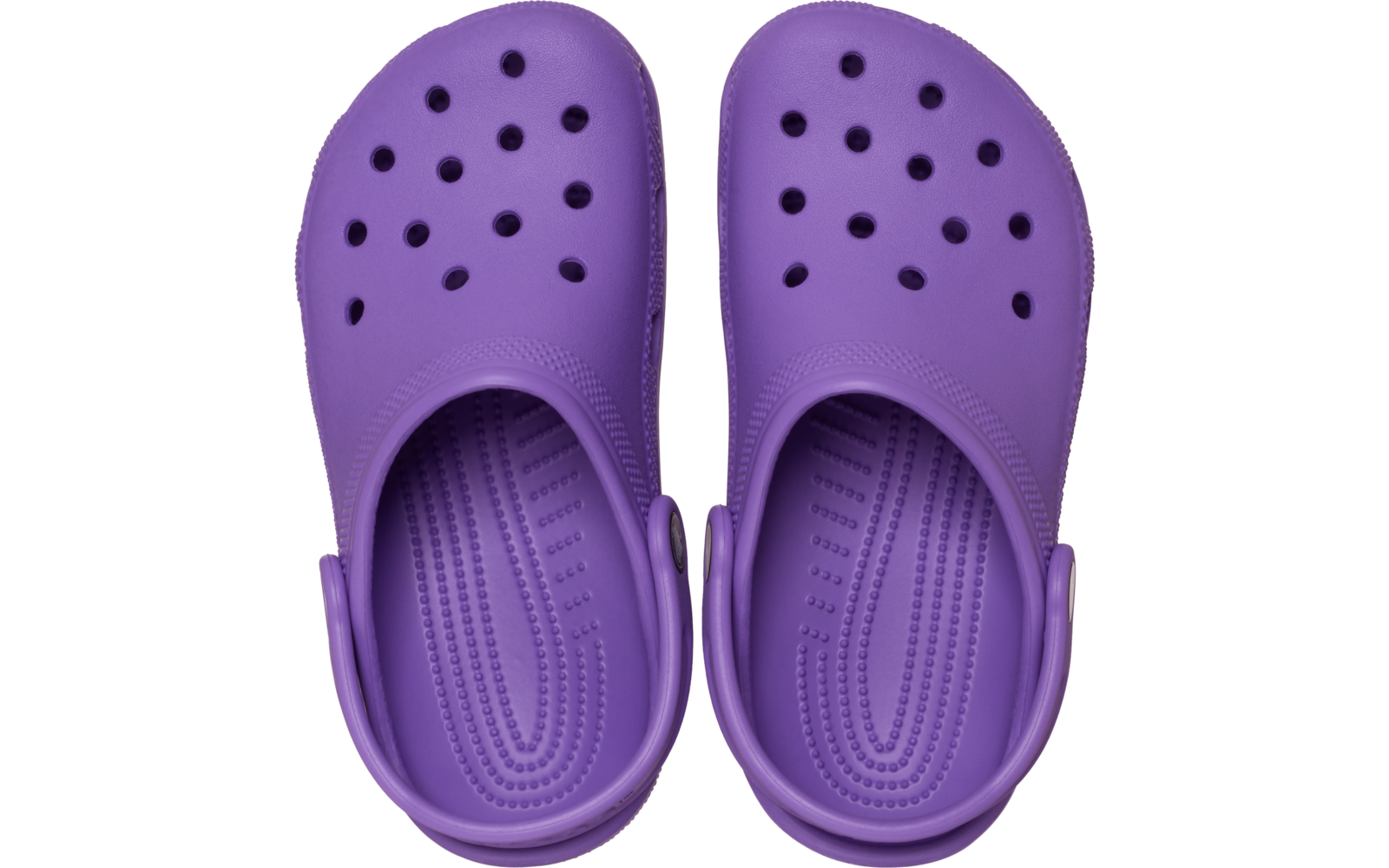 Deux sabots violets vus de dessus, chacun avec zone perforée à l'avant, semelle intérieure texturée et brides de talon rabattues vers l'arrière
