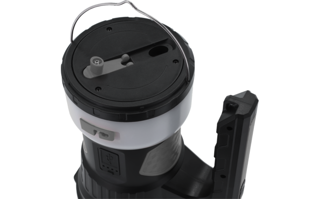 Weiß-schwarzes zylindrisches Gerät mit rundem schwarzem Deckel, Metallbügel oben, seitlichem Griff und sichtbarem USB-Anschluss