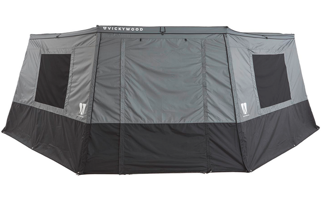Graues und schwarzes rechteckiges Textilaufbau mit zwei seitlichen rechteckigen Fenstern und geschlossener zentraler Vorderseite; auf dem Dachband Text 'VICKYWOOD'
