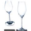 Two empty wine glasses, one standing on a black coaster, the other tilted on a black coaster