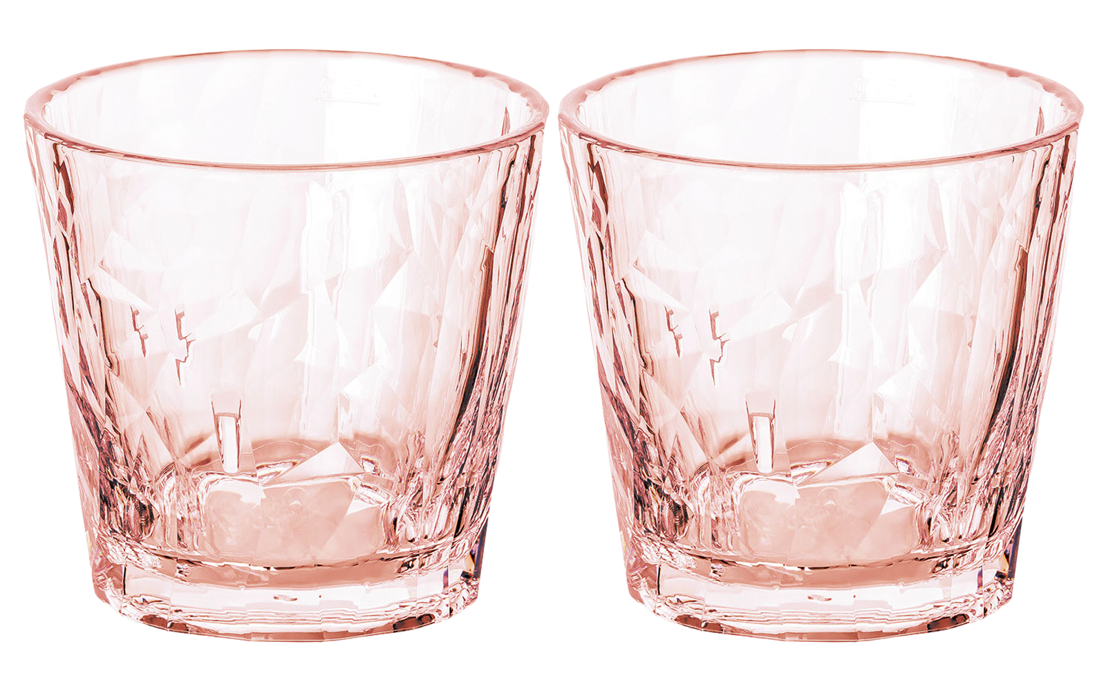 Zwei leere rote Whiskeygläser mit facettiertem Muster