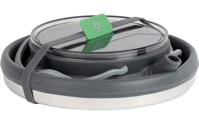Gray collapsed silicone bowl with transparent lid, gray elastic band, green label, small spout, white rim and visible "500 ml" marking