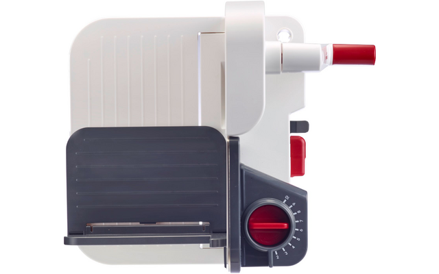 Dispositivo bianco e grigio con manopole rosse, scala circolare, superficie rettangolare e lama metallica laterale